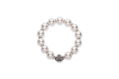 Pearl bracelet with silver charm