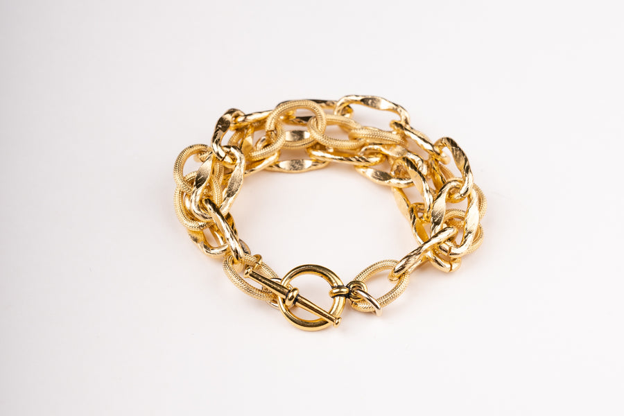 a Carolily Finery bracelet made from various gold plated chains