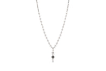 Long pearl necklace with flower accent