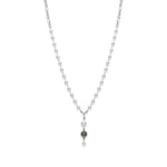 Long pearl necklace with flower accent