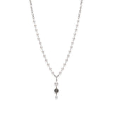 Long pearl necklace with flower accent