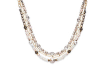 Multi strand pearl and gold chain necklace