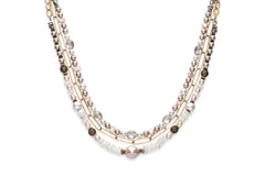 Multi strand pearl and gold chain necklace