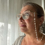 Silver and pearl eyeglass chain with glasses