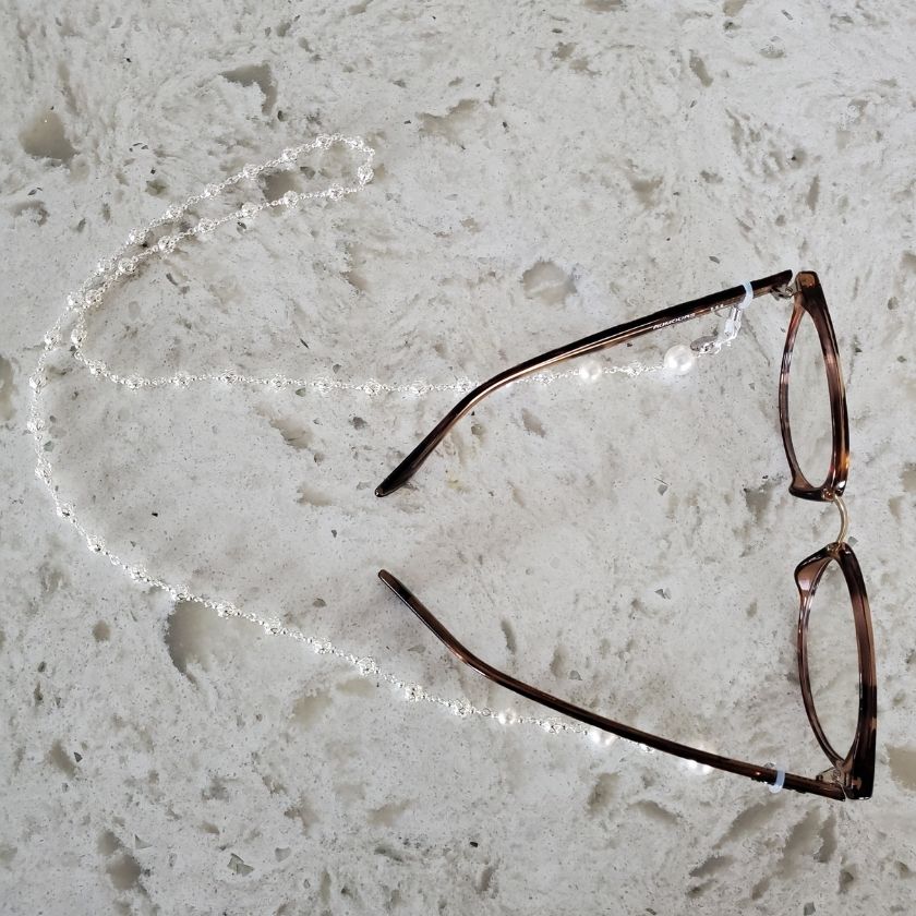 Silver and pearl eyeglass chain with glasses