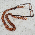 Tortoise shell eye glass chain with glasses