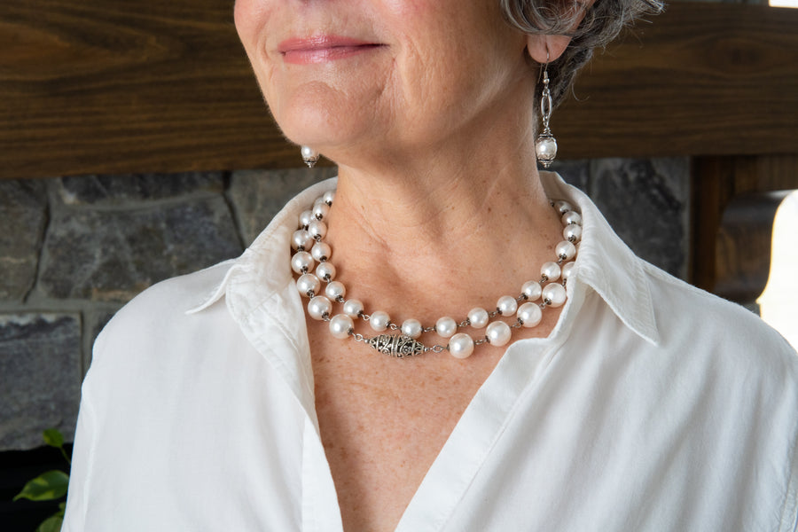 White pearl strand necklaces