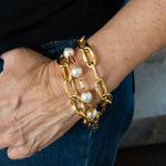 Three gold bracelets