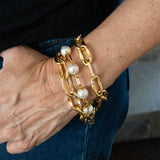 Three gold bracelets