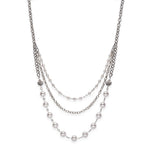 White pearl, sterling silver, pewter and stainless steel necklace
