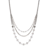 White pearl, sterling silver, pewter and stainless steel necklace