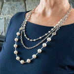 White pearl, sterling silver, pewter and stainless steel necklace