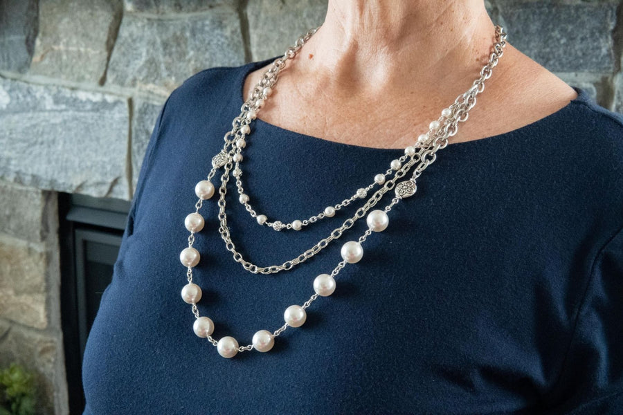White pearl, sterling silver, pewter and stainless steel necklace
