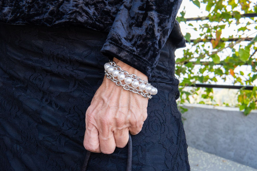 Silver chain and white pearl bracelet
