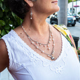 Long white pearl necklace