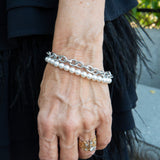 Chain and white pearl bracelet with a heart charm