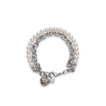 Chain and white pearl bracelet with a heart charm