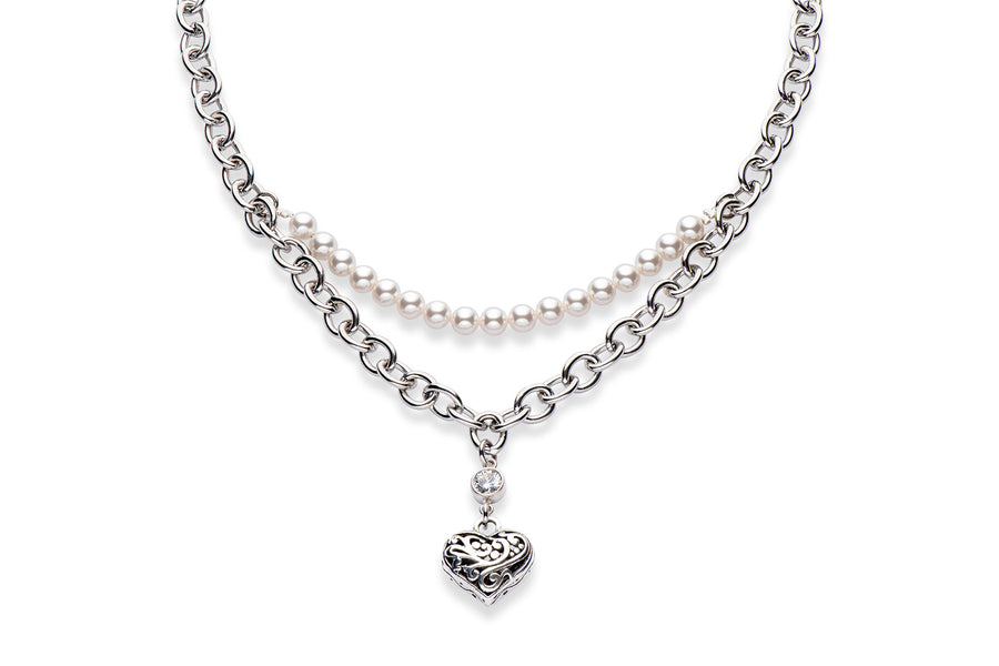 a stainless steel statement necklace with European crystal pearls and a pewter heart