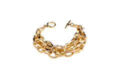 a Carolily Finery bracelet made from various gold plated chains