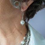 White pearl and silver earrings