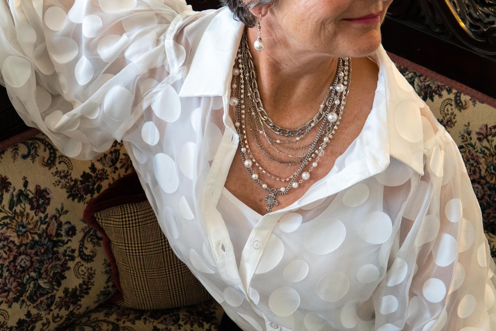 Silver, pearl and cross statement necklace