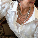 Silver, pearl and cross statement necklace