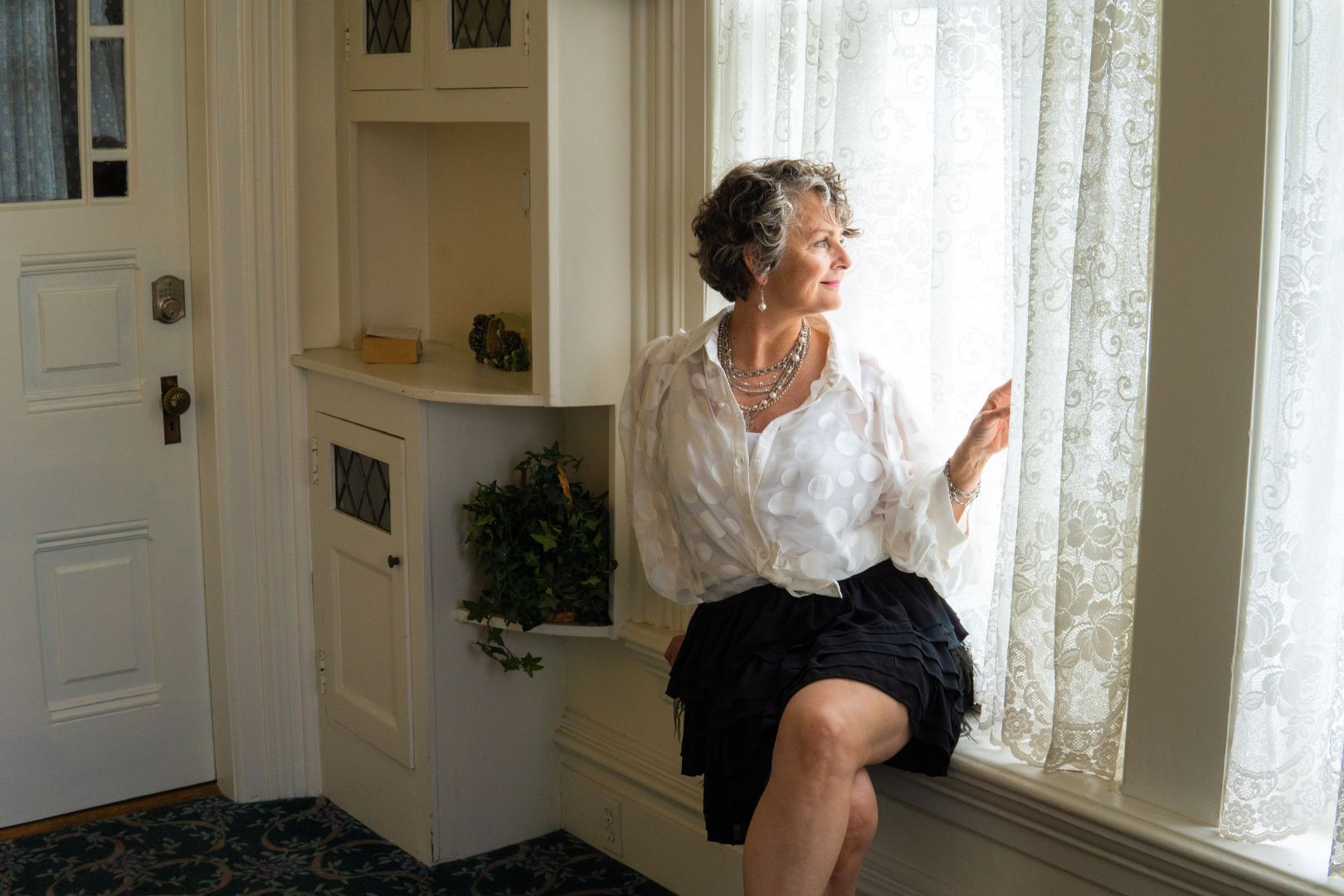 Silver, pearl and cross statement necklace