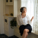 Silver, pearl and cross statement necklace