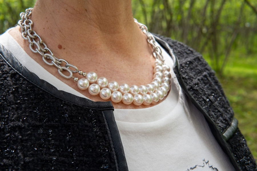 double pearl strand necklace on woman